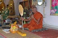 Buddhist monk is preaching to people. Royalty Free Stock Photo